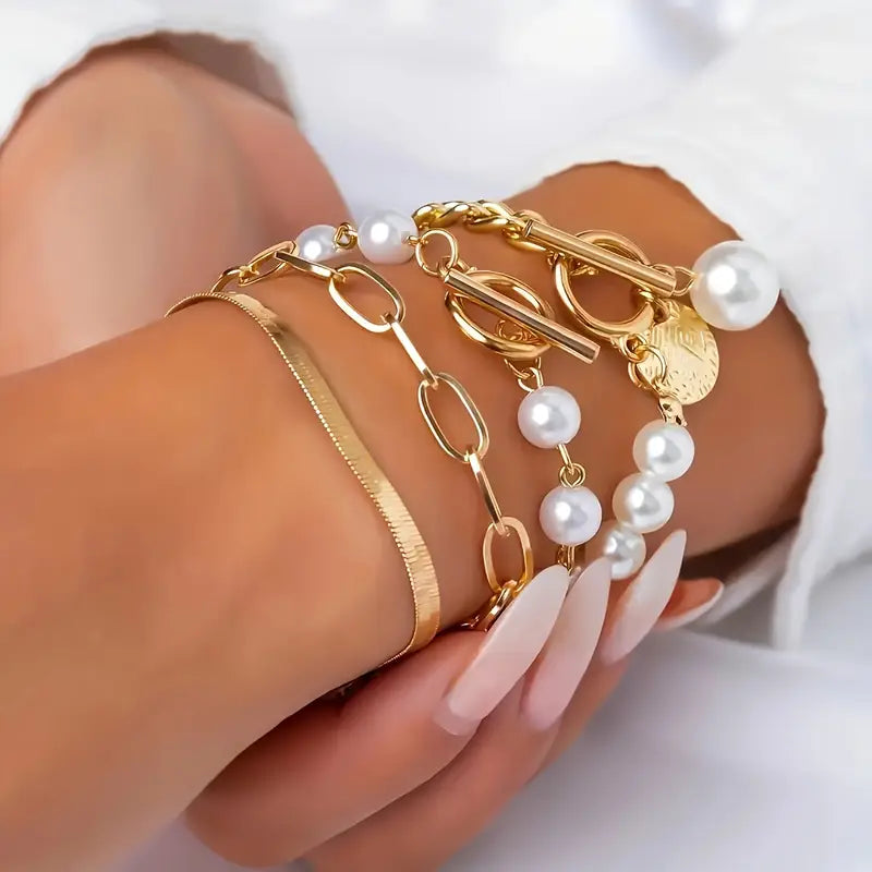 Elegant 4-Piece Gold Bracelet Set – Snake, Pearls and Links
